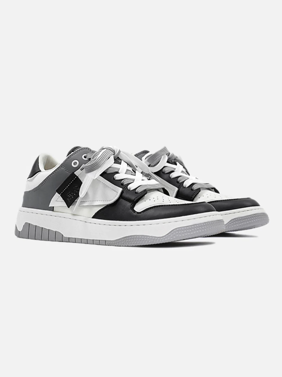 Low Top Leather Basketball Shoe in Black, Grey, and White Drip Locker