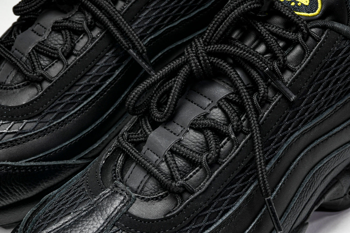 Corteiz x AM95 'Honey Black'