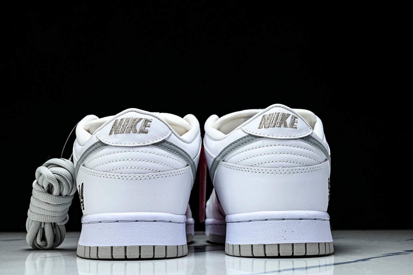 SB Dnk Low x Supreme 94 White Metallic Silver