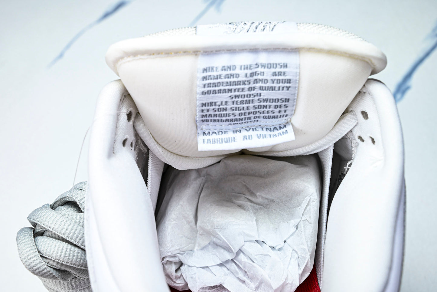 SB Dnk Low x Supreme 94 White Metallic Silver