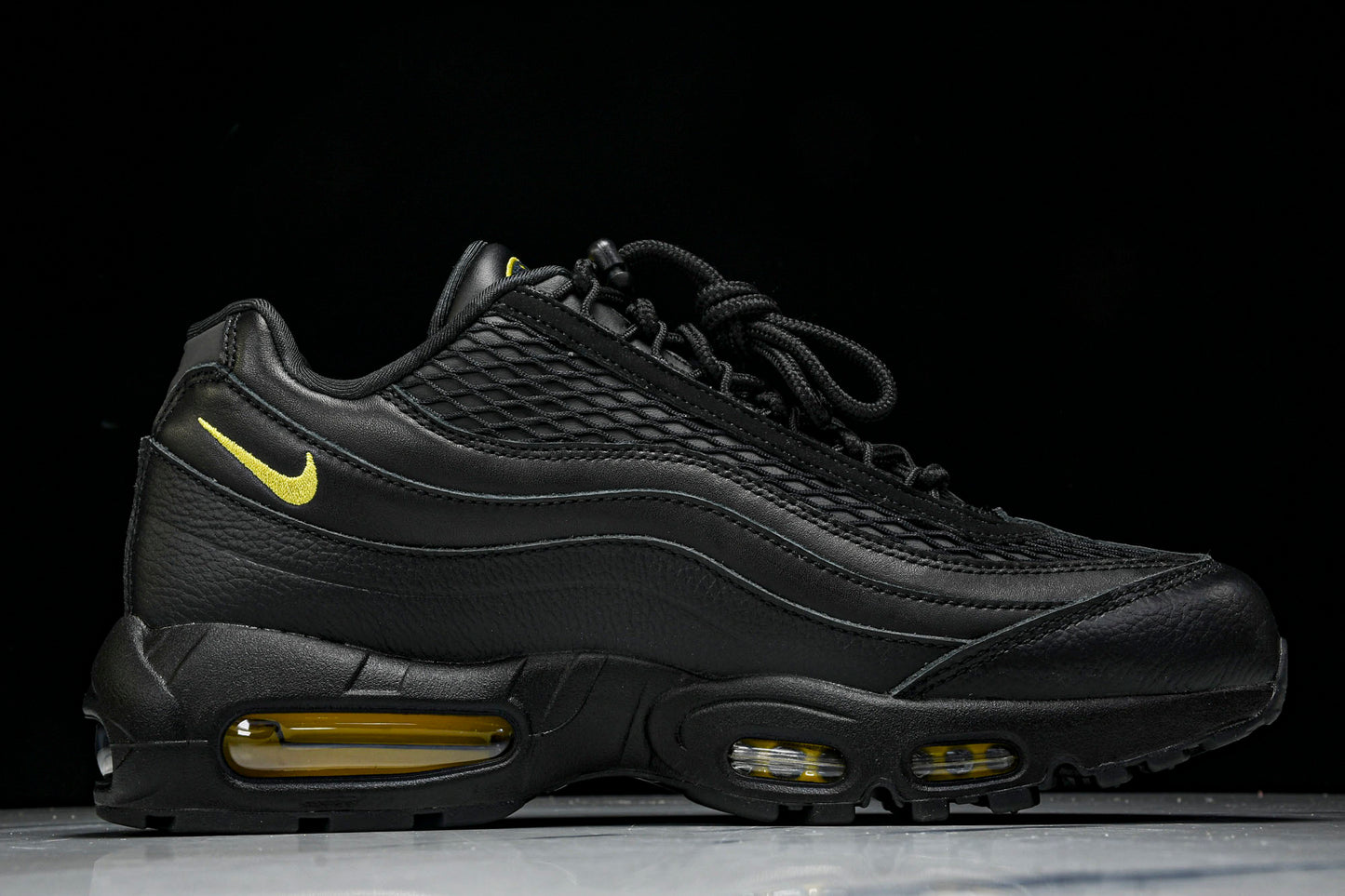 Corteiz x AM95 'Honey Black'