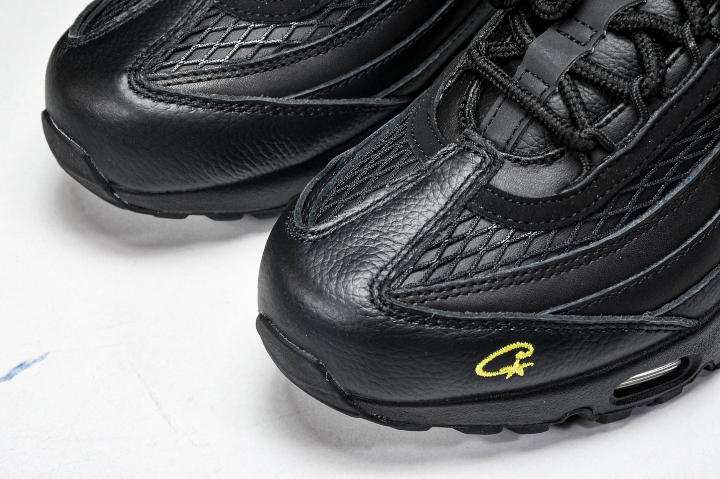 Corteiz x AM95 'Honey Black'