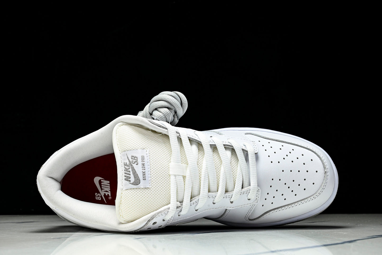 SB Dnk Low x Supreme 94 White Metallic Silver