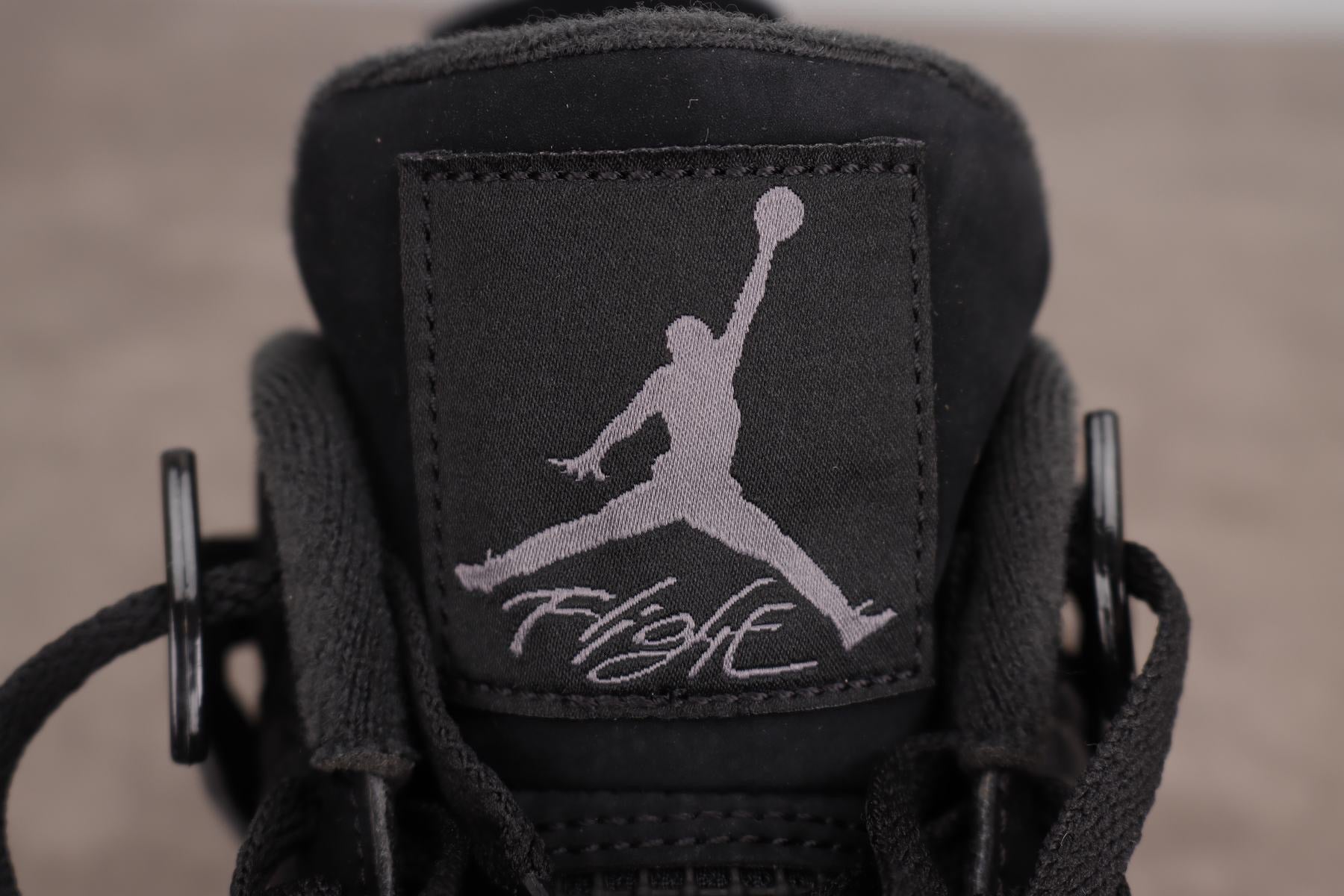 black cat tongue jordan 4