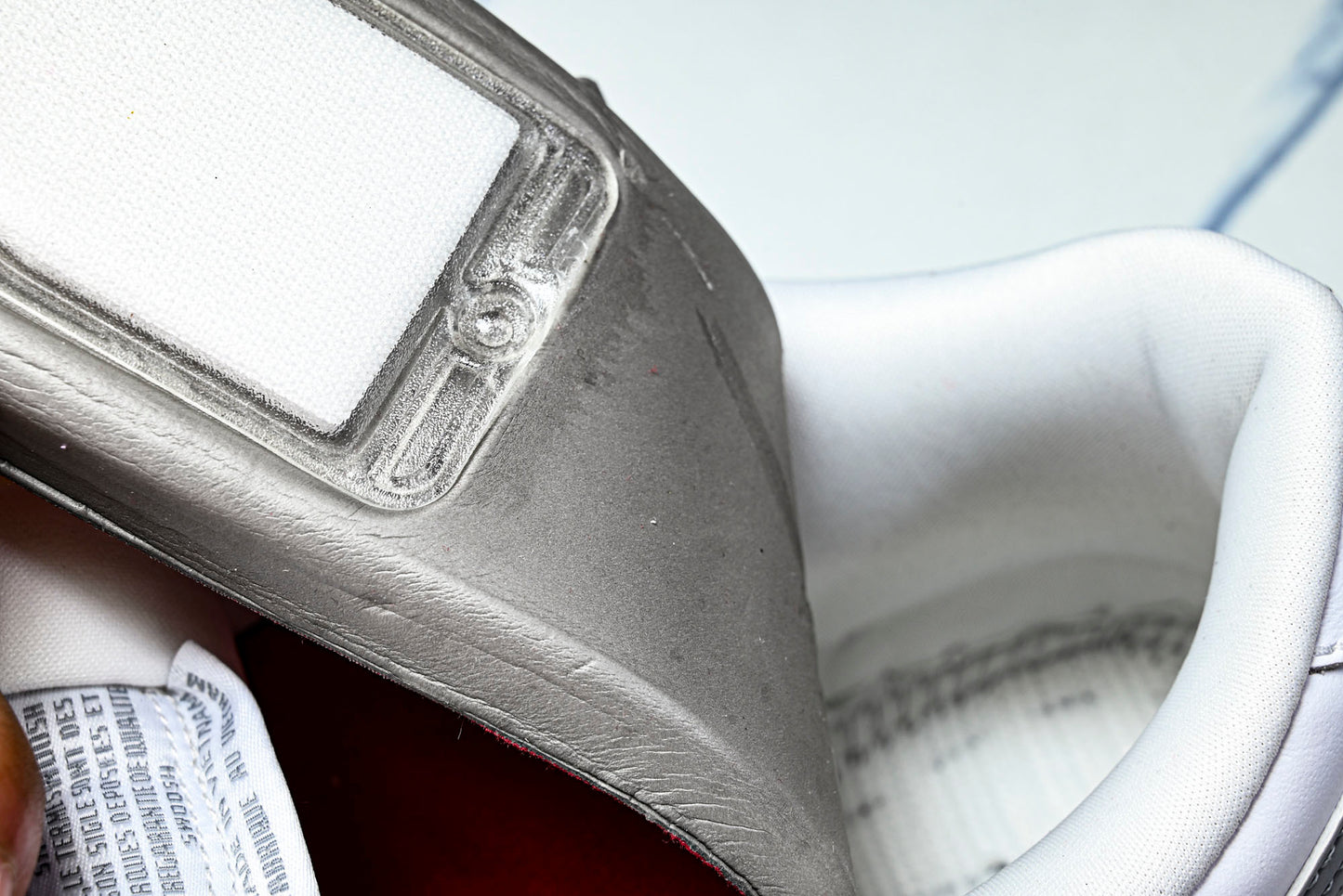 SB Dnk Low x Supreme 94 White Metallic Silver