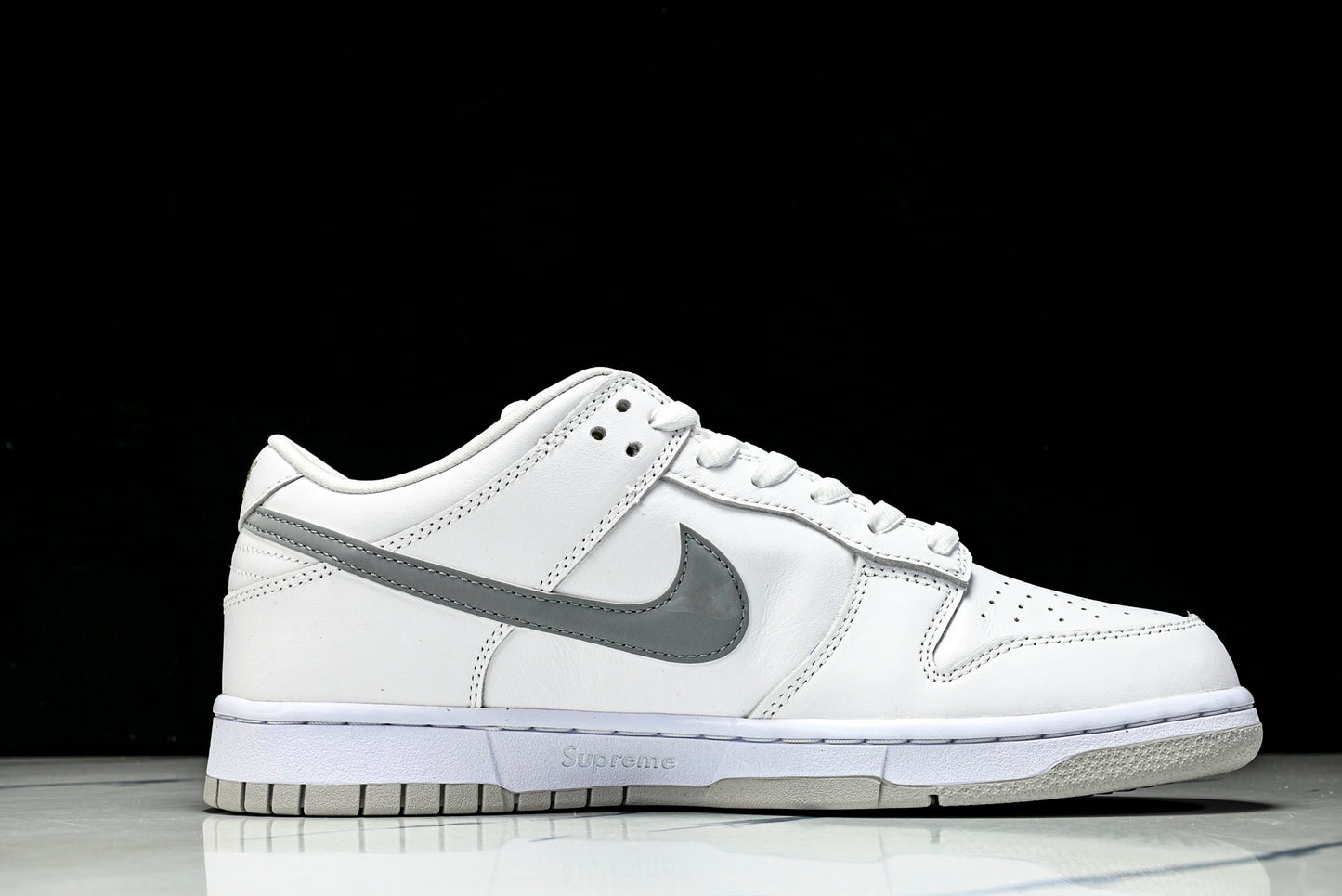 SB Dnk Low x Supreme 94 White Metallic Silver