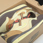 Travis Scott AM1 'Baroque Brown'